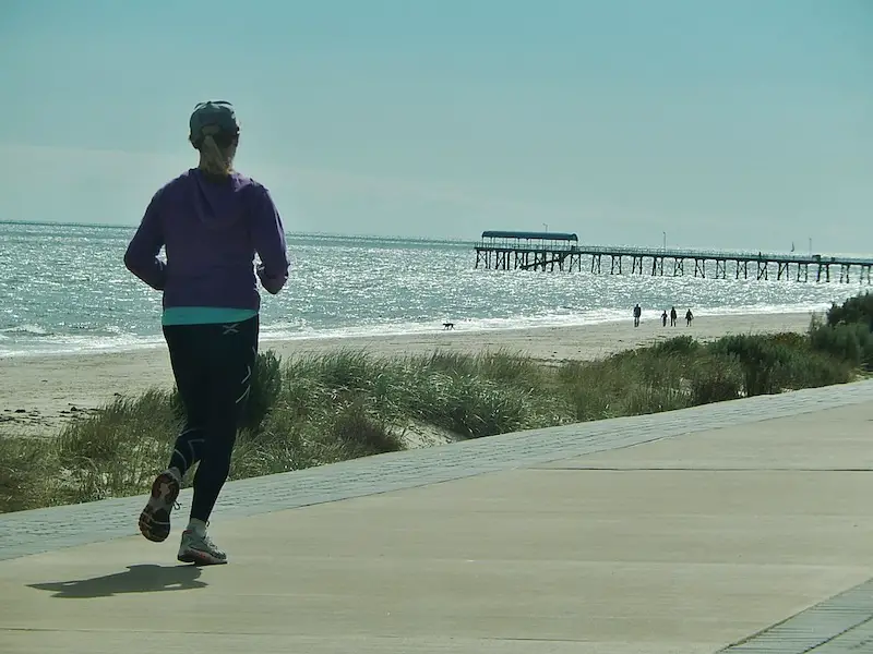 woman-running-beach-front
