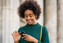 woman-using-mobile-phone-increae-app-downloads
