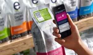 hand smartphone scan QR code On packaging label