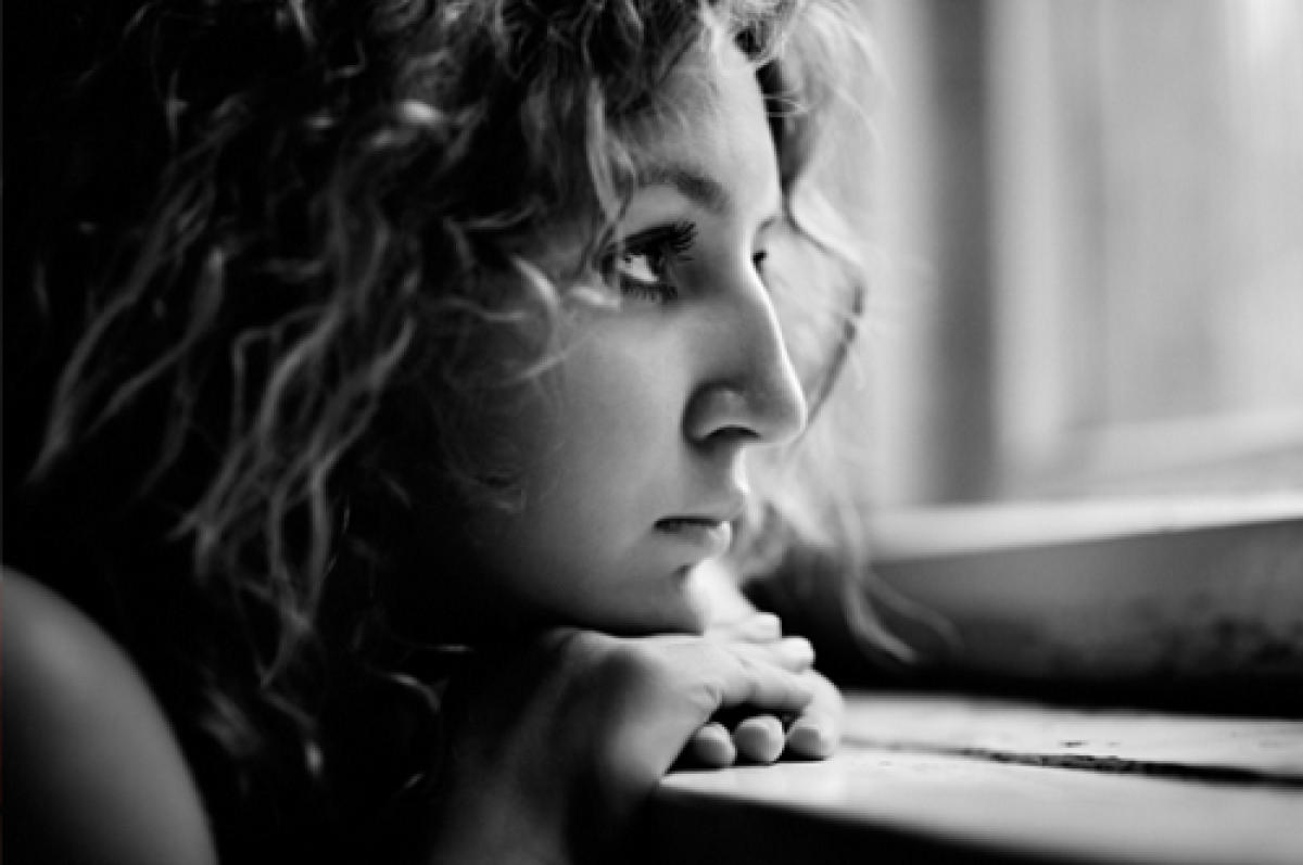 15 Reasons Why You're Not as Successful as You Should Be woman-looking-out-window-contemplating-reasons-not-as-successful