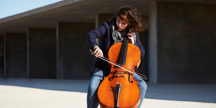 beautiful-girl-plays-cello-with-passion-concrete-environment.jpg