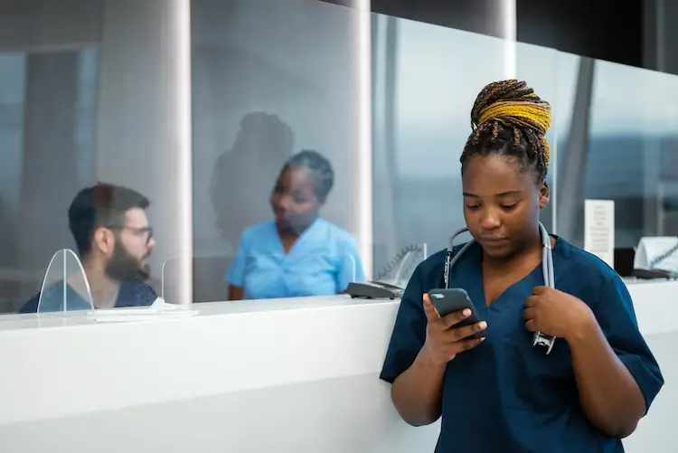 nurse-using-smartphone-in-hospital